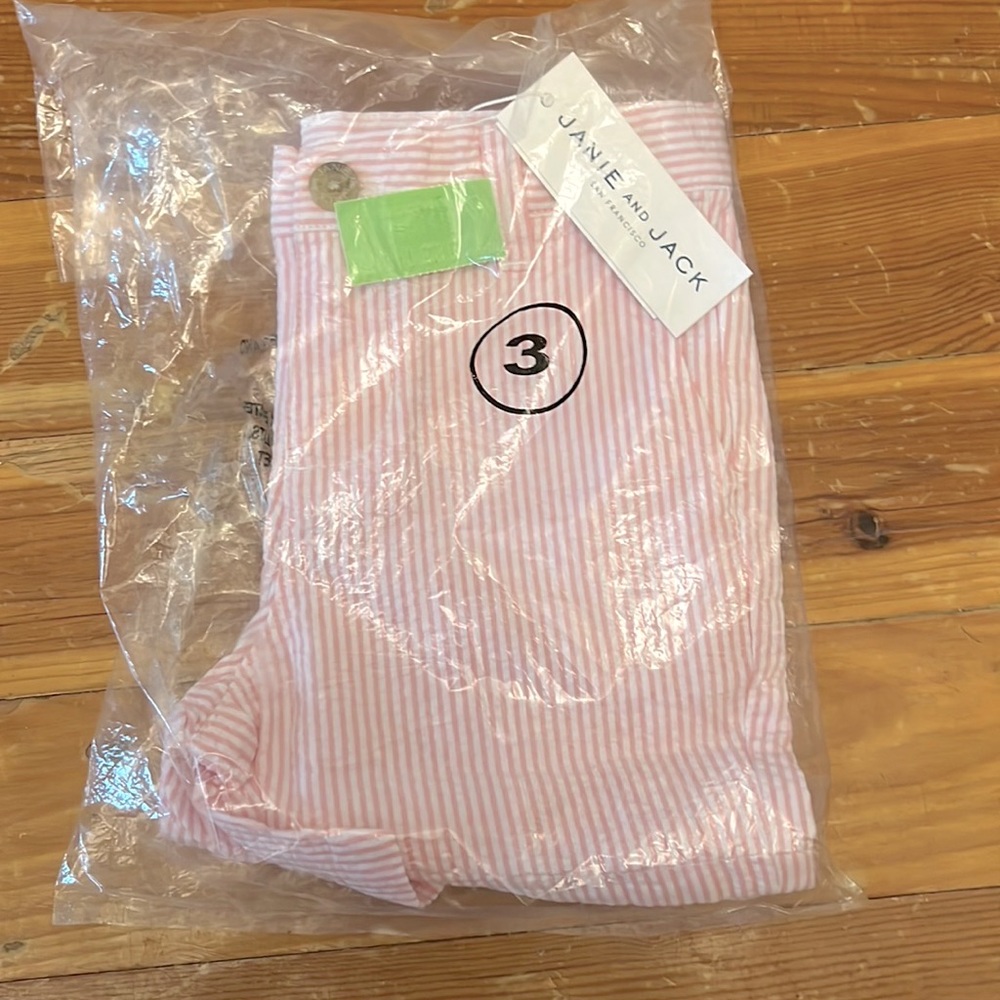 NWT and never taken out of bag Toddler boy Seersucker pink and white shorts